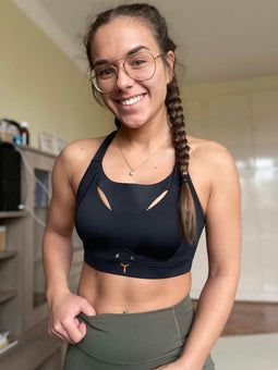 Personal trainer wearing the black Tigers Eye bra.