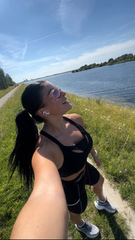 Danish Active Duty military woman wearing the black Tigers Eye bra for a run.